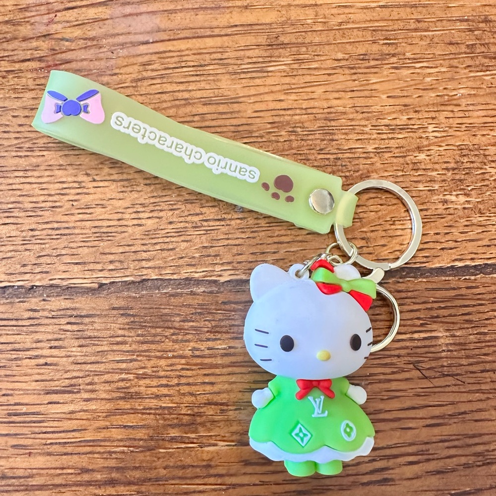 NWOT Sanrio Hello Kitty Keychain in Green and Red